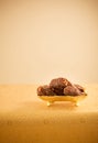 Arabian dates in golden plate Royalty Free Stock Photo