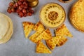 Arabian dinner table with pita bread, hummus and grapes