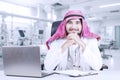 Arabian doctor smiling in the laboratory