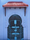 Arabian entrance gate in african Chefchaouen town in Morocco, vertical Royalty Free Stock Photo