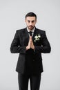 Arabian groom with praying hands looking Royalty Free Stock Photo