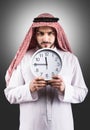 Arabian man with the clock