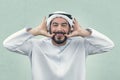 Arabian man doing a funny expression , Clumsy expression of an Arabian businessman Royalty Free Stock Photo