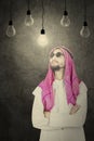 Arabian man looking at light bubble Royalty Free Stock Photo