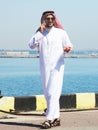 Arabian man talking on the cell phone in the port Royalty Free Stock Photo