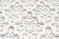 Arabian Muslim Islamic white oriental national pattern with relief elements. Textured white wall, mosque decor element.