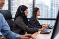 Arabian or Muslim woman works in a call center operator Royalty Free Stock Photo