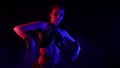 arabian night performance, woman is performing exotic dance in darkness, moving hands slowly