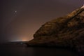 The arabian night on the sea of Oman, with reflections, stars an Royalty Free Stock Photo