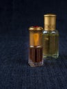 Arabian oud attar perfume or agarwood oil fragrances in mini bottles. Royalty Free Stock Photo