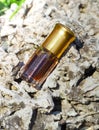 Arabian oud attar perfume or agarwood oil fragrances in mini bottle. Royalty Free Stock Photo