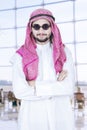 Arabian person standing in the airport