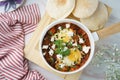 ARABIAN SUNRISE breakfast food with pita bread served in a dish isolated on table side view of arabian breakfast Royalty Free Stock Photo