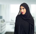 Arabian woman posing in a business center