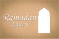 Arabic arch windows or doors and `Ramadan Kareem`, paper cut style Royalty Free Stock Photo