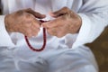 Arabic Bedouin Muslim man in traditional white holiday clothing