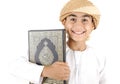 Arabic boy with Koran