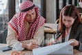 Arabic business people working together on project at office Royalty Free Stock Photo