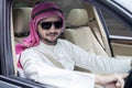 Arabic businessman driving a car