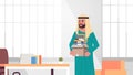 Arabic businessman office worker holding box with stuff things new job business concept creative workplace modern office