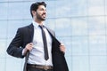 Arabic businessman or worker standing in suit near office building Royalty Free Stock Photo