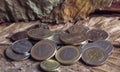 Arabic coins of dirhams and Euro coins on vintage background.