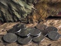 Arabic coins of dirhams on vintage background.