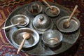 Arabic copper tableware and utensils. Traditional turkish metal antique silver and copper pots, plates
