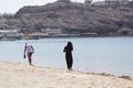 An Arabic couple at the beach in Aden