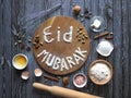Arabic cuisine background. Mubarak - Islamic holiday welcome phrase ` happy holiday`, greeting reserved.