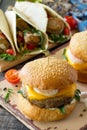 Arabic cuisine. Ramadan food. Homemade vegetarian mung cutlets burger on white a wooden kitchen table.
