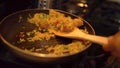 The Arabic dish Pilaf cooking in a pan