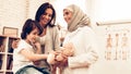 Arabic Doctor Giving Toy to Little Cute Patient