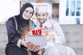 Arabic family with promo online on tablet