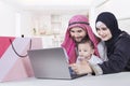 Arabic family using laptop