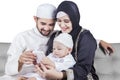 Arabic family using smartphone together