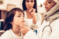 Arabic Female Doctor Examining a Little Boy Royalty Free Stock Photo