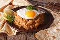 Arabic ful medames with fried eggs close-up on the table. horizontal Royalty Free Stock Photo