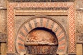 Arabic gate Puerta de San Esteban in traditional style, carved walls of ancient Mezquita, Mosque-Cathedral of Cordoba Royalty Free Stock Photo