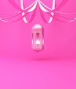 Arabic hanging lantern with ribbon on pink pastel background.