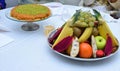 Arabic konafa with mixed fruit plate. Royalty Free Stock Photo