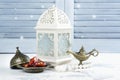 Arabic lantern, dates, aladdin lamp and rosary on white background Royalty Free Stock Photo