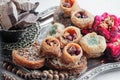 Arabic, Lebanese and Turkish sweets kataifi and kanafeh, a Traditional Eastern dessert made of thin dough with syrup , nuts and Royalty Free Stock Photo