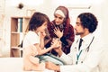 Arabic Male Doctor Give Medicine to Sick Boy. Confident Muslim Male Doctor Giving Glass of Medicine. Child at the Pediatrician.