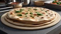 Arabic naan roti paratha food. on kitchen countertop.