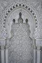 Arabic Patterns carved on a marble wall in Morocco Royalty Free Stock Photo