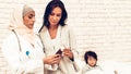 Arabic Pediatrician Giving Medicine Mom Sick Son