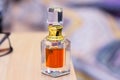 Arabic perfume called oud in a crystal bottle and blurry background