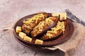 Arabic recipe stuffed eggplants with red lentils, chicken meat, tomato, onion and cheese
