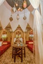 Arabic restaurant interior with tables, chairs and shisha at resort